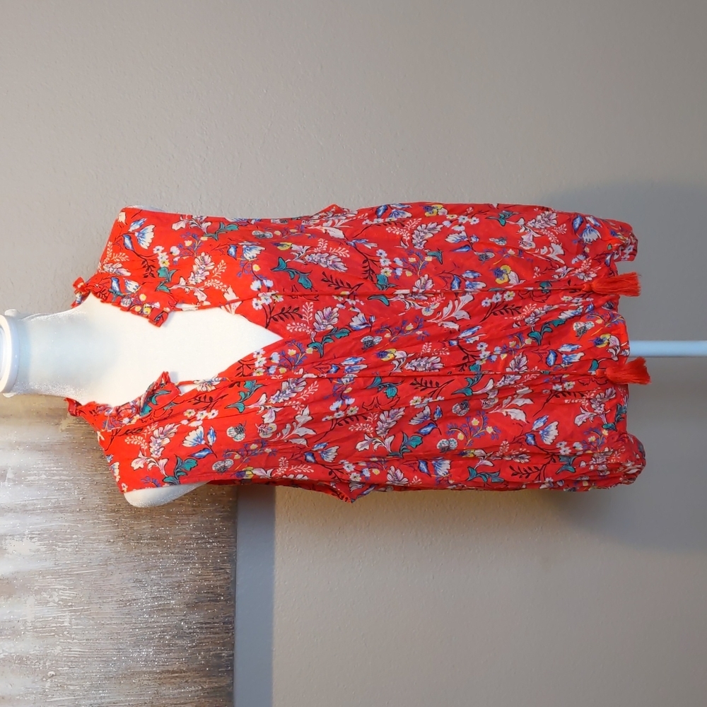 En Creme red floral cross over top